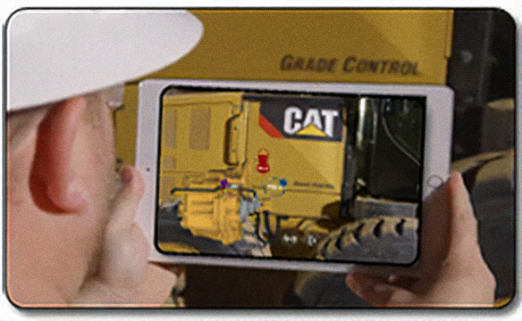 Technician using an augmented reality headset on the shop floor