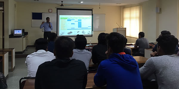 Students working on CAD software as part of the CADOpt University Program